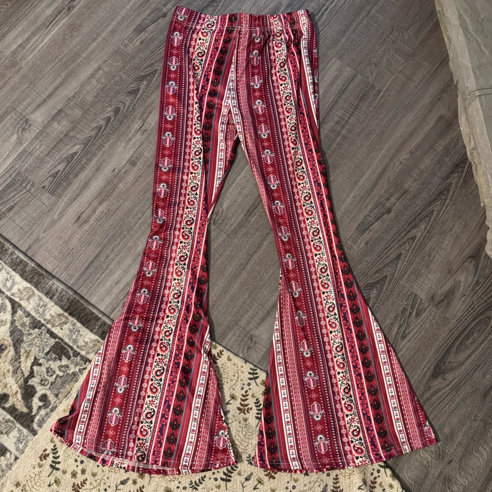 NEW WITH TAGS Flared leggings from a small business. Size Medium.